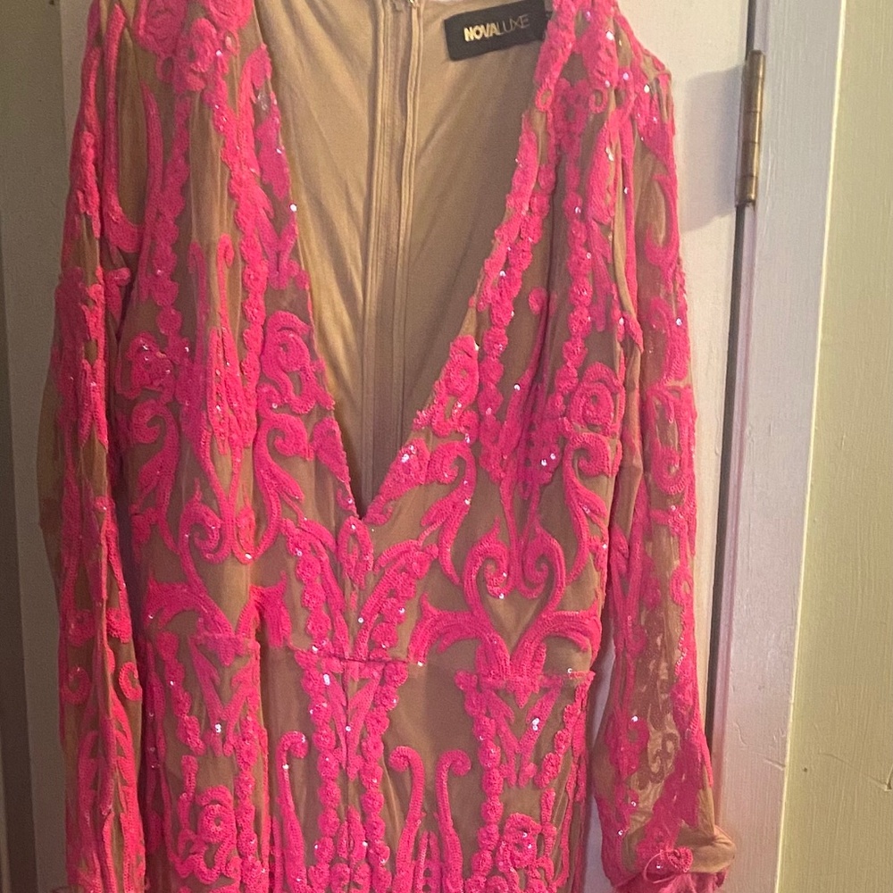 Show stopping romper beautifully sequin! Great birthday outfit!